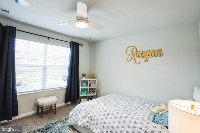 bedroom featuring carpet, visible vents, ceiling fan, and baseboards