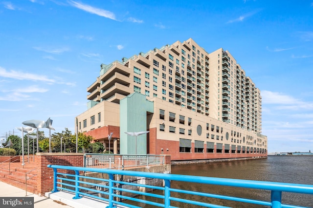 view of building exterior featuring a water view