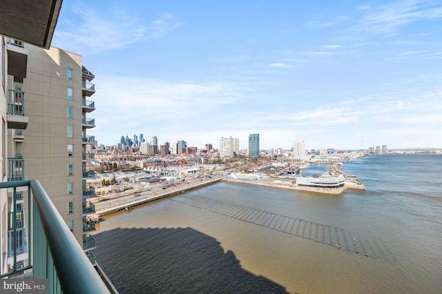 view of water feature with a city view