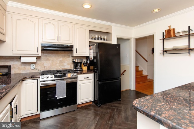 kitchen with open shelves, under cabinet range hood, tasteful backsplash, freestanding refrigerator, and stainless steel range with gas cooktop