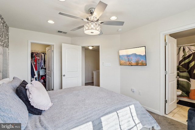 bedroom with visible vents, carpet, a spacious closet, a closet, and recessed lighting