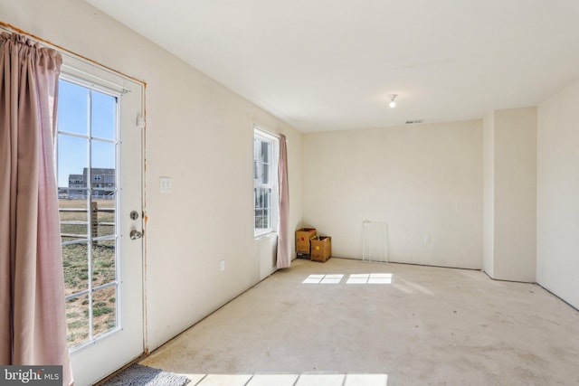 doorway to outside with visible vents and a healthy amount of sunlight