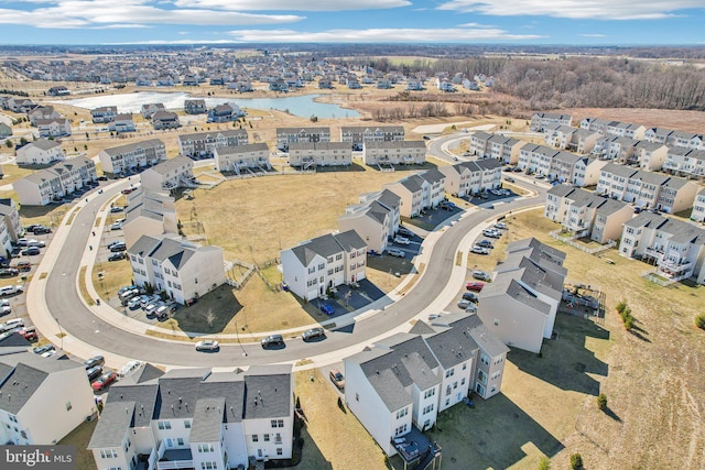 birds eye view of property with a residential view