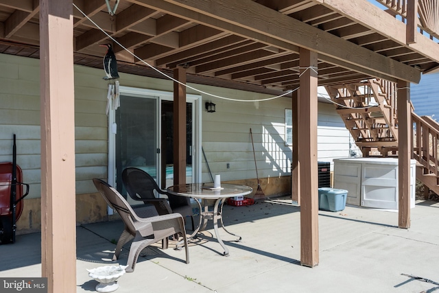 view of patio / terrace featuring stairway