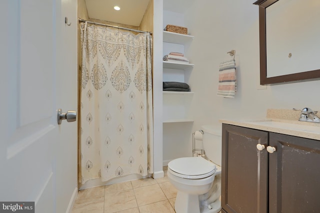 bathroom with tile patterned floors, toilet, a shower with shower curtain, and vanity