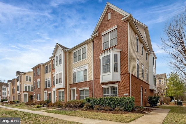 view of property with a residential view