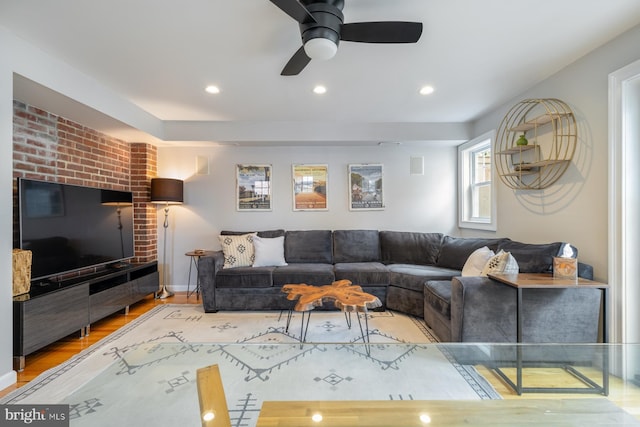 living room featuring recessed lighting, wood finished floors, and ceiling fan