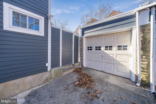 garage with driveway