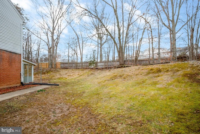 view of yard with fence