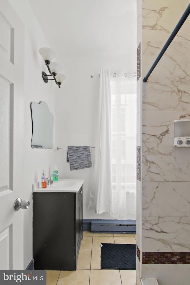 3823 Poplar St, Philadelphia, PA 19104 - bathroom featuring a shower with shower curtain, vanity, and tile patterned floors
