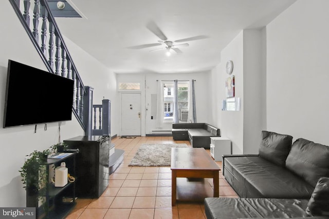 3823 Poplar St, Philadelphia, PA 19104 - living room featuring ceiling fan, stairway, cooling unit, and light tile patterned flooring