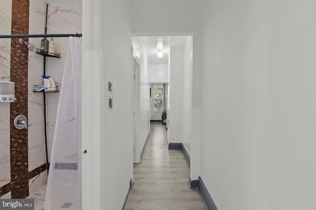 3823 Poplar St, Philadelphia, PA 19104 - hall with light wood-style flooring and baseboards