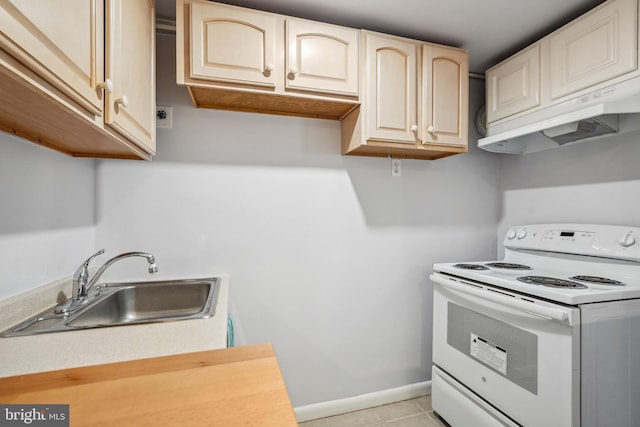 kitchen with under cabinet range hood, a sink, white electric stove, light countertops, and baseboards