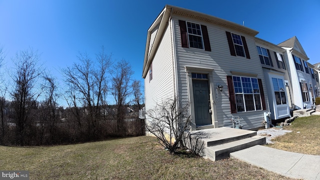 view of front of house with a front lawn