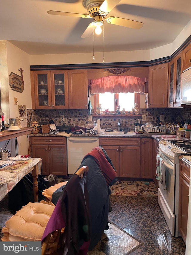 kitchen featuring white range with electric cooktop, granite finish floor, backsplash, a sink, and dishwasher