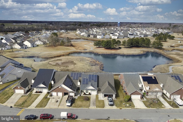 aerial view featuring a water view and a residential view