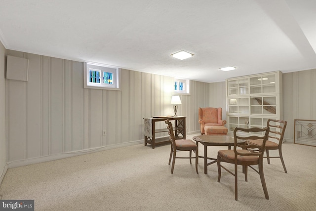 living area featuring carpet flooring