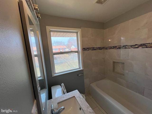 bathroom with visible vents and vanity