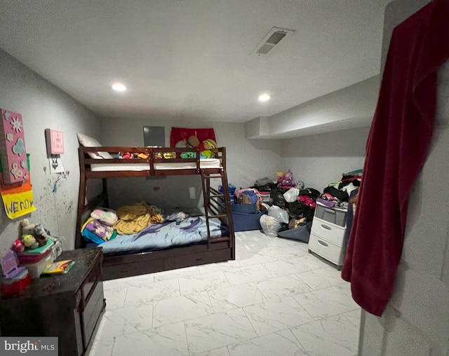 bedroom with recessed lighting, marble finish floor, and visible vents