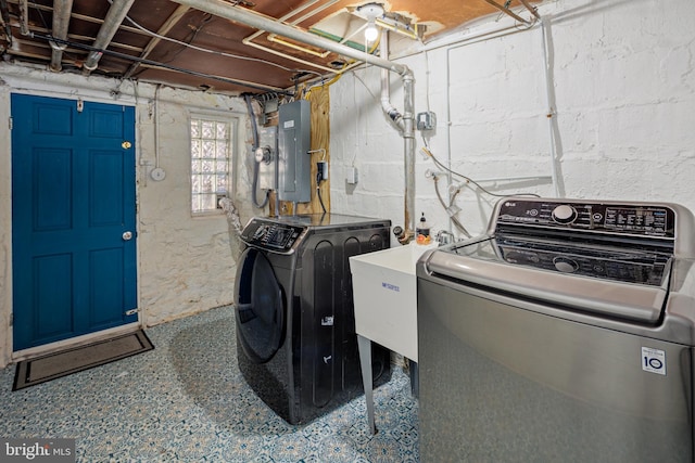 laundry room featuring washer / dryer, laundry area, and electric panel