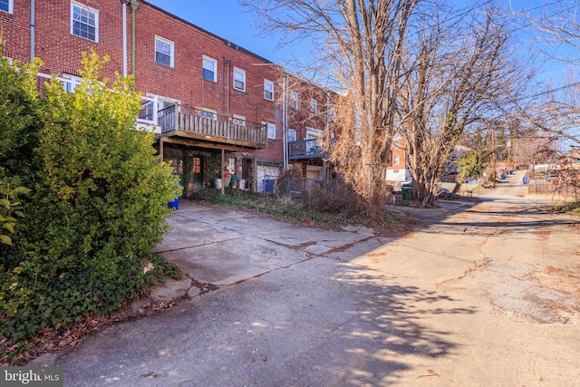 rear view of house with brick siding