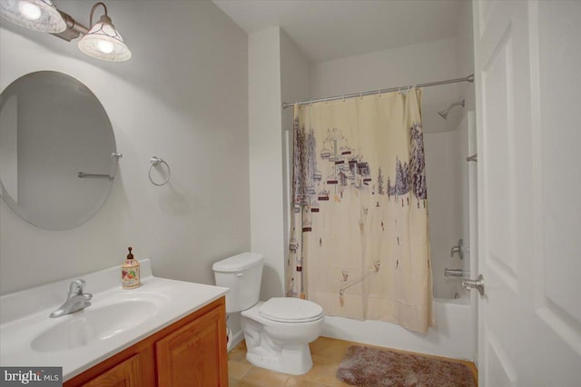 full bathroom featuring toilet, tile patterned flooring, shower / tub combo with curtain, and vanity