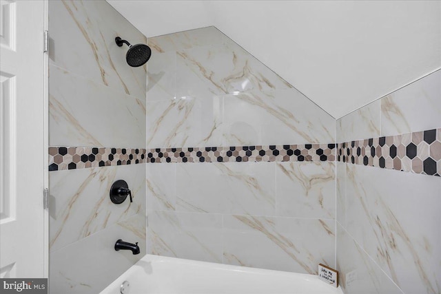 details featuring shower / bathing tub combination