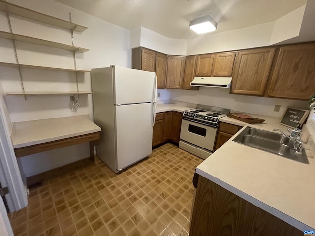 kitchen with white appliances, a sink, light countertops, range hood, and open shelves