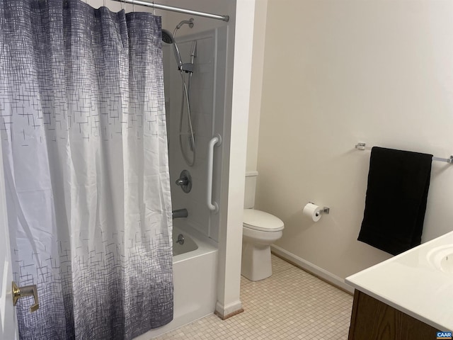 bathroom featuring toilet, shower / tub combo, vanity, baseboards, and tile patterned floors