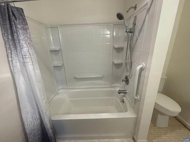 bathroom featuring tile patterned flooring, shower / bath combination with curtain, and toilet