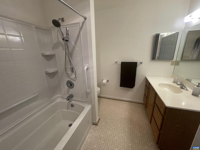 full bath featuring toilet, vanity, baseboards,  shower combination, and tile patterned floors