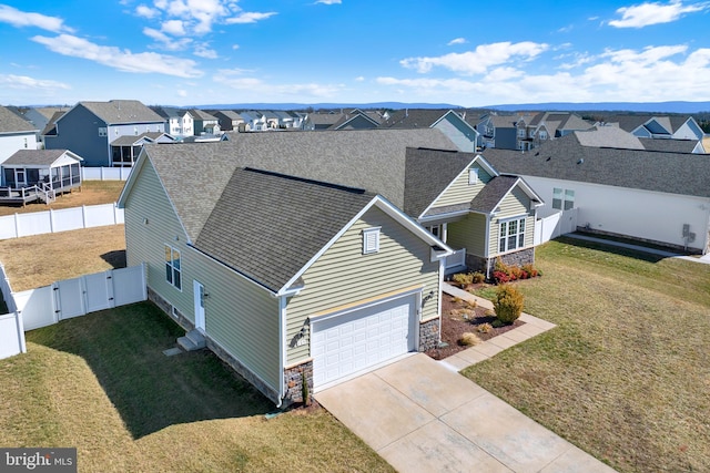 drone / aerial view with a residential view