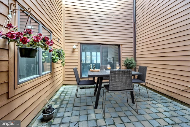 view of patio with outdoor dining space