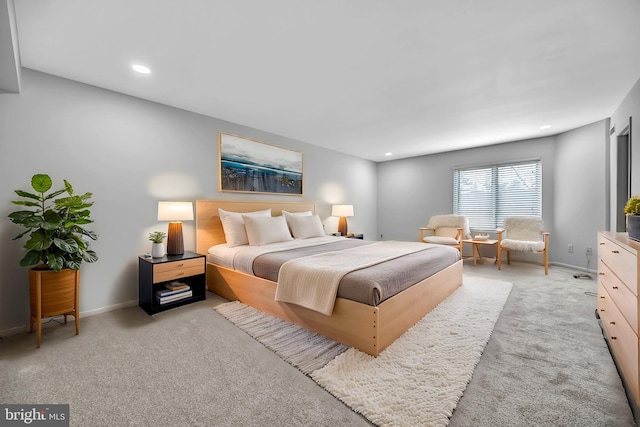 bedroom with recessed lighting, carpet flooring, and baseboards