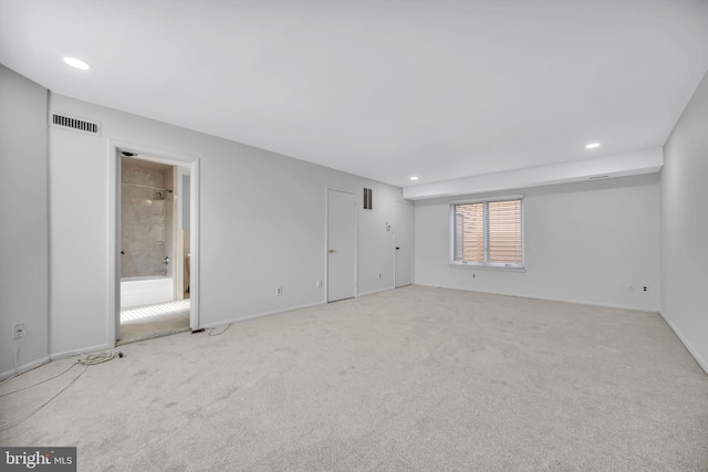 interior space with baseboards, visible vents, and recessed lighting