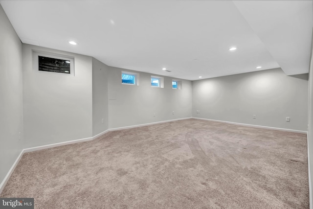 basement featuring recessed lighting, carpet flooring, and baseboards