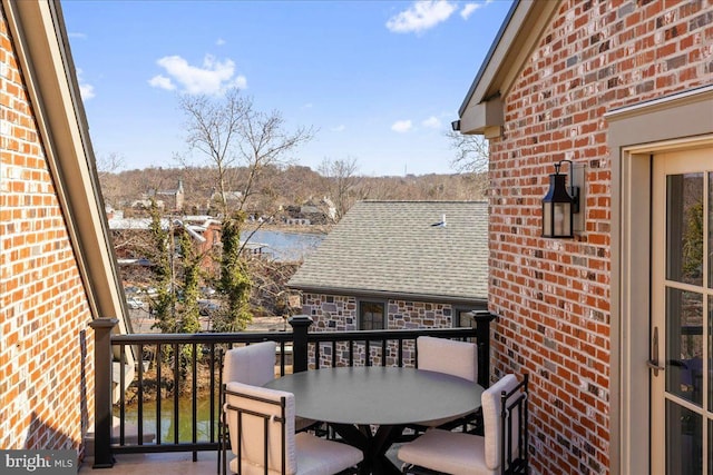 balcony featuring outdoor dining area