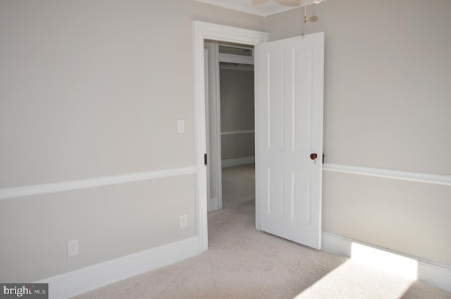 unfurnished bedroom with carpet and baseboards