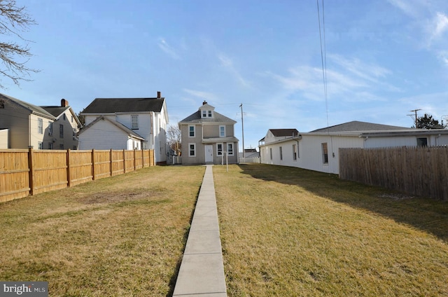 view of yard featuring a fenced backyard