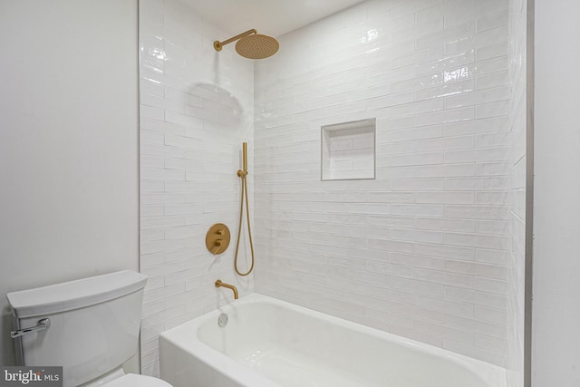 bathroom with shower / washtub combination and toilet