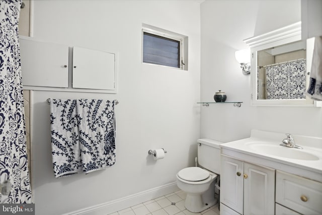 full bath with a shower with shower curtain, vanity, toilet, and baseboards