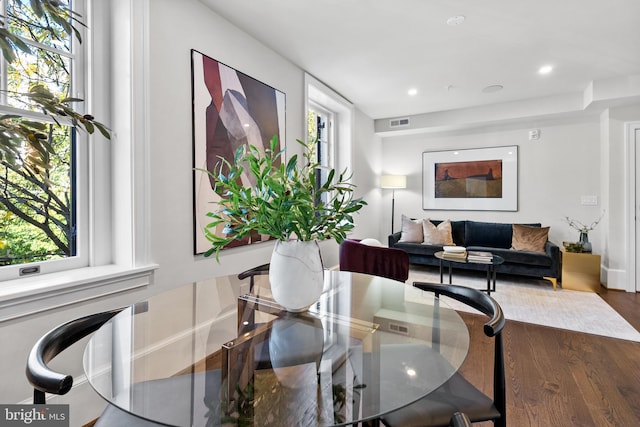 dining area with visible vents, recessed lighting, and wood finished floors