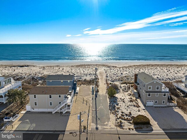 5909 Ocean Blvd, Long Beach Township, NJ 08008 - drone / aerial view featuring a beach view and a water view
