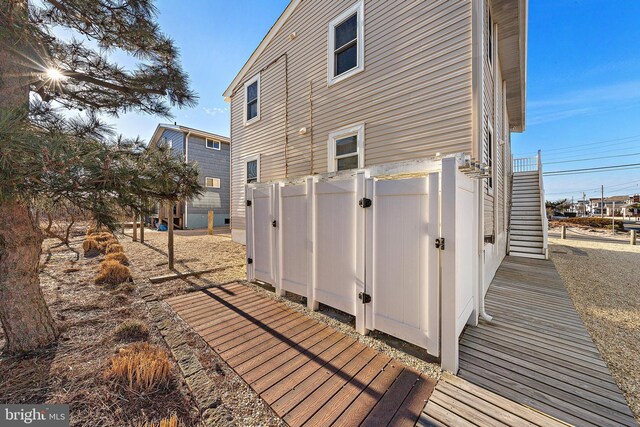 5909 Ocean Blvd, Long Beach Township, NJ 08008 - back of house with fence and a gate