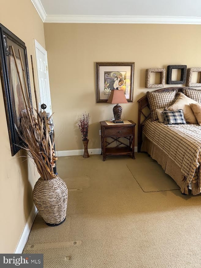 bedroom with light carpet, crown molding, and baseboards