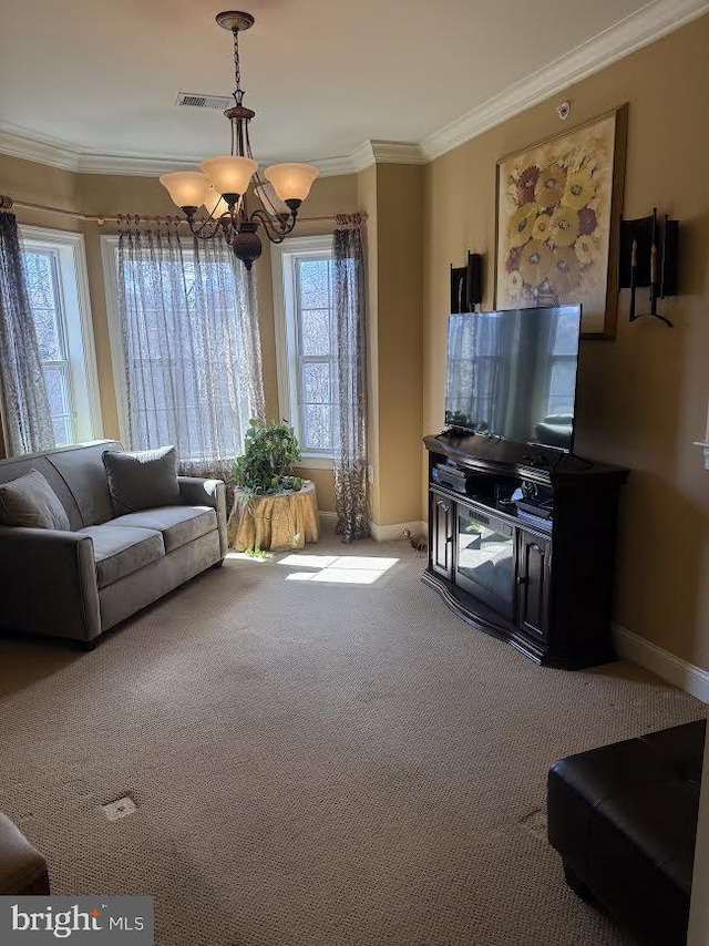 carpeted living area with baseboards, a notable chandelier, and crown molding