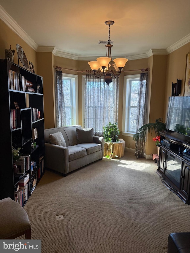 living area featuring ornamental molding, carpet flooring, a notable chandelier, and visible vents