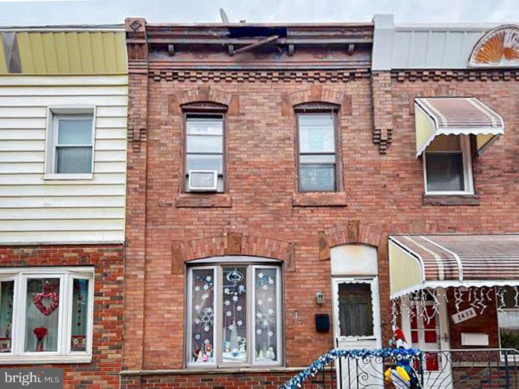 view of front of property with brick siding