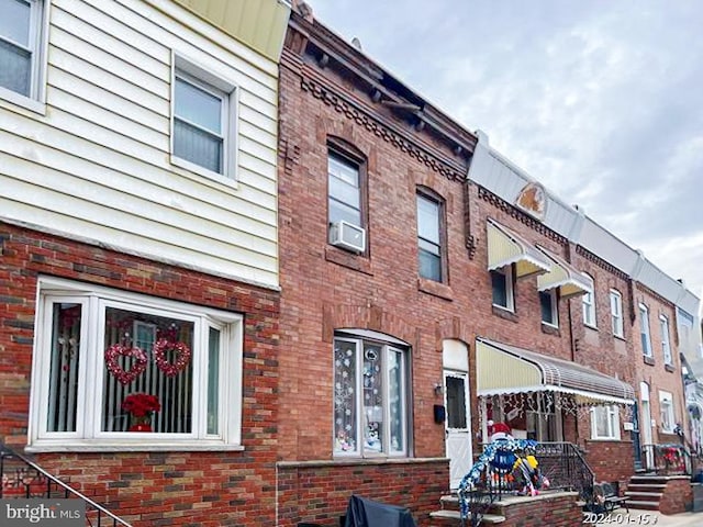 view of property with cooling unit