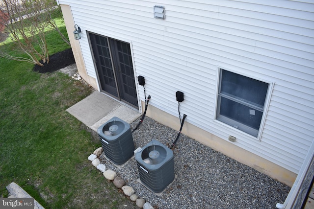 exterior details featuring central AC unit